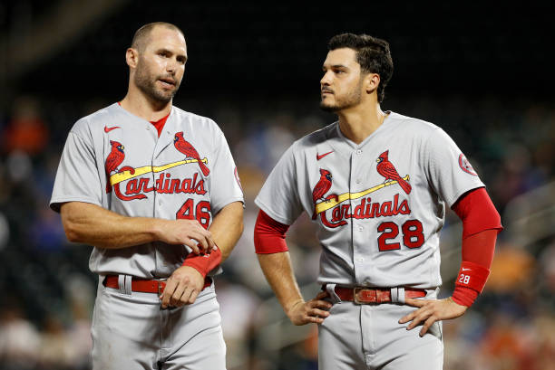 Paul Goldschmidt and Nolan Arenado of the St. Louis Cardinals look on after the first inning against the New York Mets at Citi Field on September 14,...