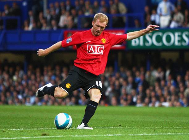 Paul Scholes of Manchester United scores the opening goal during the Barclays Premier League match between Portsmouth and Manchester United at...