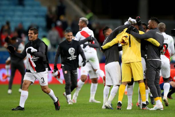 Pedro Gallese of Peru celebrates with teammates after winning the Copa America Brazil 2019 Semi Final match between Chile and Peru at Arena do Gremio...