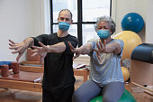 people doing exercise At rehab center wearing mask