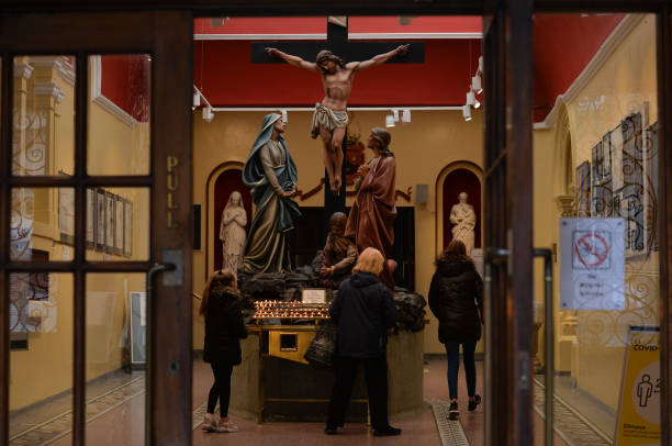 People entering to pray to Whitefriar Church in Dublin, on Good Friday 2021, during level 5 COVID-19 lockdown. On Friday, 2 April 2021, in Dublin,...