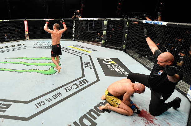 Petr Yan of Russia celebrates after his TKO victory over Jose Aldo in their UFC bantamweight championship fight during the UFC 251 event at Flash...