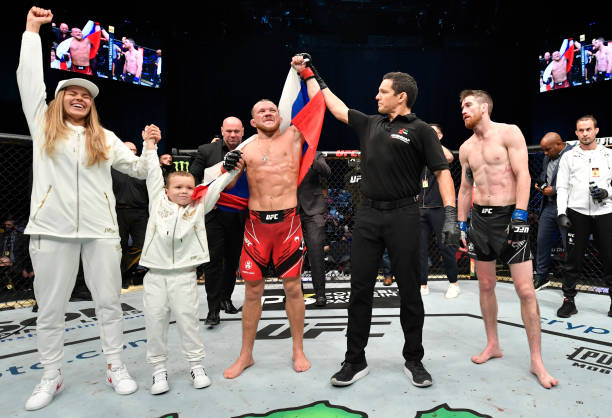 Petr Yan of Russia celebrates after his victory over Cory Sandhagen in the UFC interim bantamweight championship fight during the UFC 267 event at...