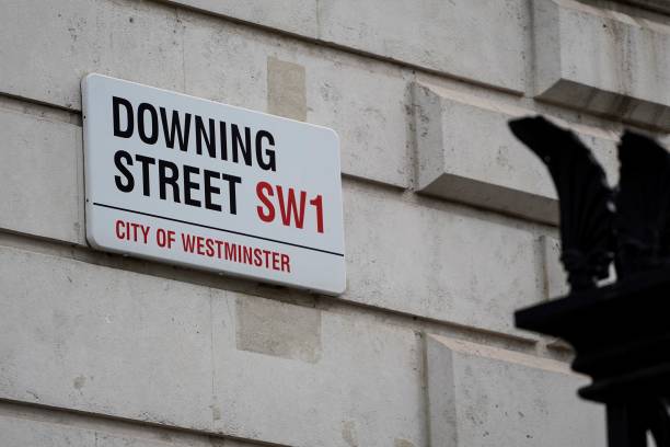 Photograph taken on June 6, 2022 shows the street sign for Downing Street, in central London. - British Prime Minister Boris Johnson faced a...