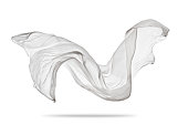 Piece of flying white cloth on white background