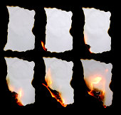 Piece of paper burning in different stages