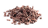 A Pile of Raw Chocolate Nibs on a White Background