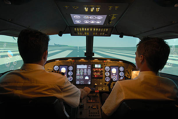 pilots taxing on airport runway picture id200553914 001?k=20&m=200553914 001&s=612x612&w=0&h=TPguef89lcoJHFiSkspj NndCLRXJOsJFhgT