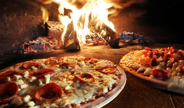pizzas in pizza oven picture id1184155896?k=20&m=1184155896&s=612x612&w=0&h=7vHO68Om