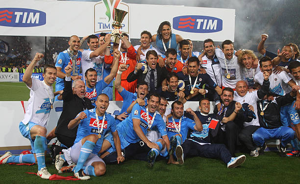 Players of SSC Napoli celebrate with the trophy after winning the Tim Cup final match against Juventus FC at Olimpico Stadium on May 20, 2012 in...