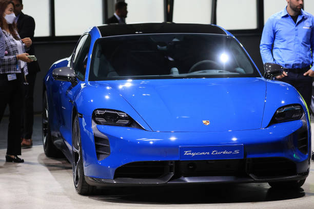 porsche taycan electric vehicle exhibited during the groundbreaking picture