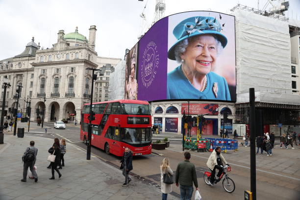 GBR: Queen Elizabeth II Platinum Jubilee 2022 - Queen Elizabeth II Features On Piccadilly Circus Billboard To Mark Start of Platinum Jubilee