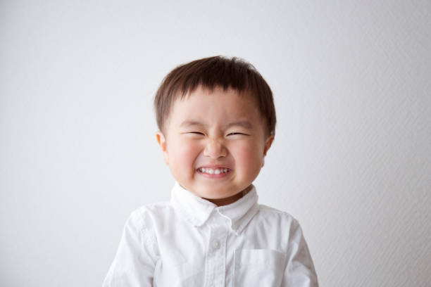 portrait of smiling boy - big grin stock pictures, royalty-free photos & images