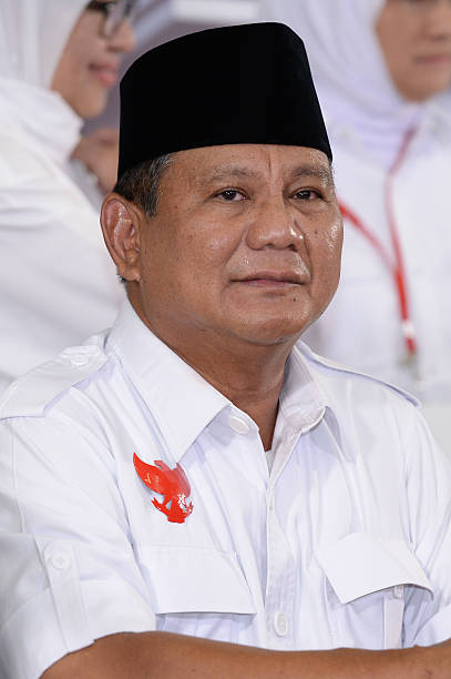 Prabowo Subianto presidential candidate smiles during a news conference after a debate against opponent Joko Widodo in Jakarta Indonesia on Saturday...