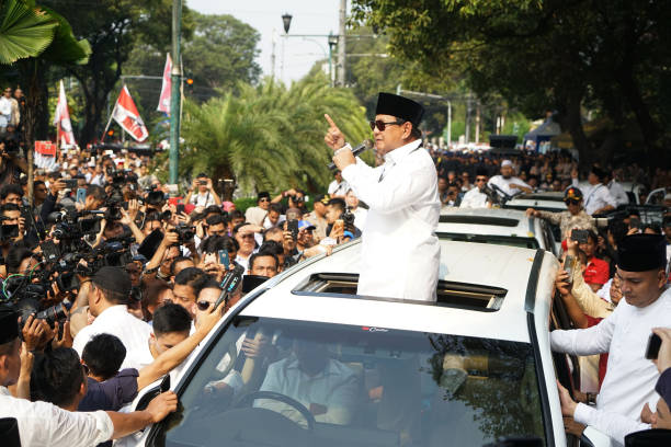 Prabowo Subianto presidential candidate speaks to supporters after submitting his nomination papers to the General Election Commission in Jakarta...