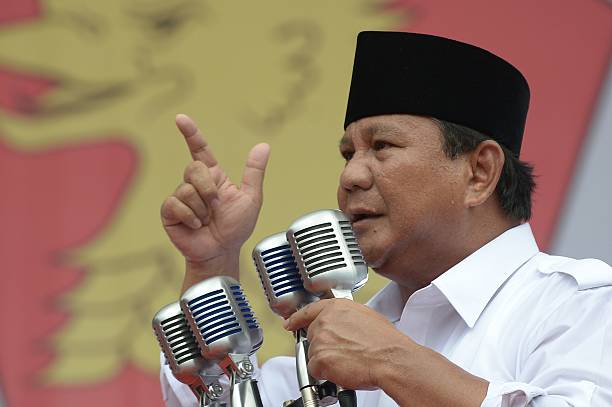 Prabowo Subianto the presidential candidate for the Great Indonesia Movement gestures as he delivers a speech ahead of the legislative elections in...