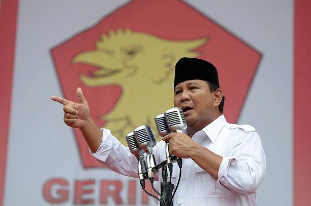 Prabowo Subianto the presidential candidate for the Great Indonesia Movement gestures as he delivers a speech ahead of the legislative elections in...