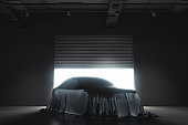 Presentation of the car covered with black cloth. 3d rendering