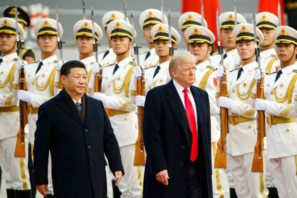 President Donald Trump takes part in a welcoming ceremony with China's President Xi Jinping on November 9, 2017 in Beijing, China. Trump is on a...