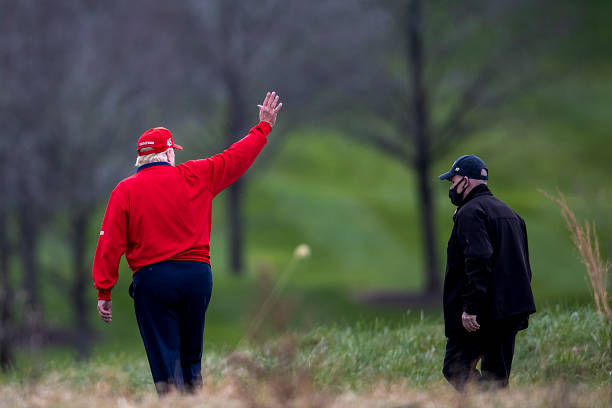 President Donald Trump walks to Marine One after golfing at Trump National Golf Club on November 27, 2020 in Sterling, Virginia. President Trump...