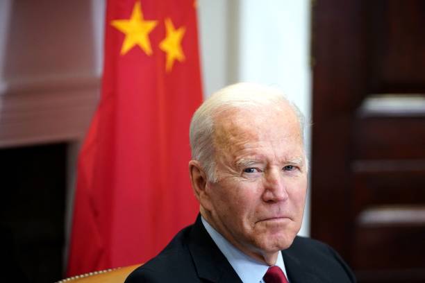 President Joe Biden meets with China's President Xi Jinping during a virtual summit from the Roosevelt Room of the White House in Washington, DC,...