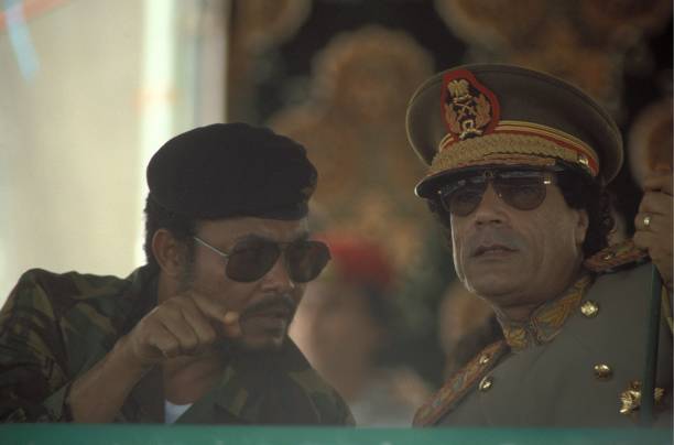 President of Ghana Jerry John Rawlings and Muammar Al Gaddafi during the 18th Anniversary Of The Libyan Revolution in 1987