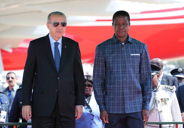 President of Turkey Recep Tayyip Erdogan and President of Zambia Edgar Lungu stand in silence during an official welcoming ceremony at the Kenneth...