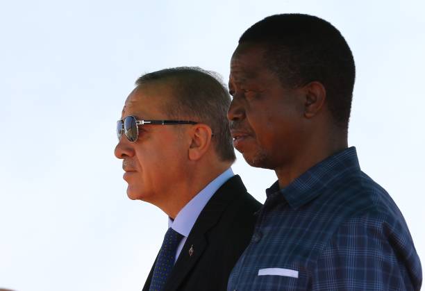 President of Turkey Recep Tayyip Erdogan and President of Zambia Edgar Lungu stand in silence during an official welcoming ceremony at the Kenneth...