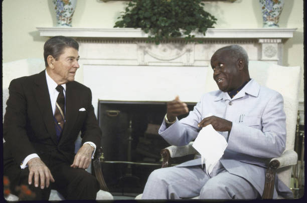 US President Ronald W Reagan sitting with the President of Zambia Kenneth D Kaunda in the Oval Office