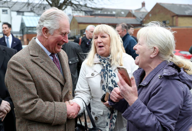 Prince Charles Prince of Wales during a visit to the town of Pontypridd to meet residents and businesses affected by recent floods and to meet those...