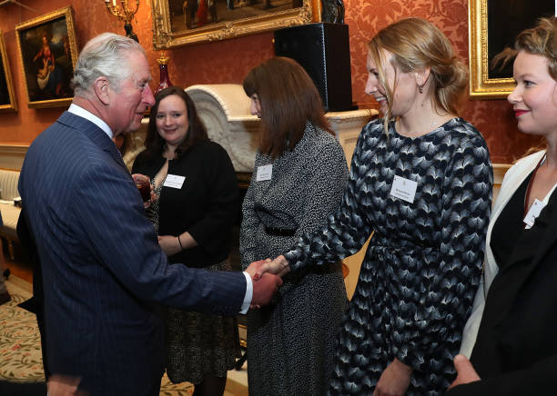 Prince Charles Prince of Wales shakes hands with Dr Sarah Phelms of the University of Exeter who won the prize for broadbased research identifying...