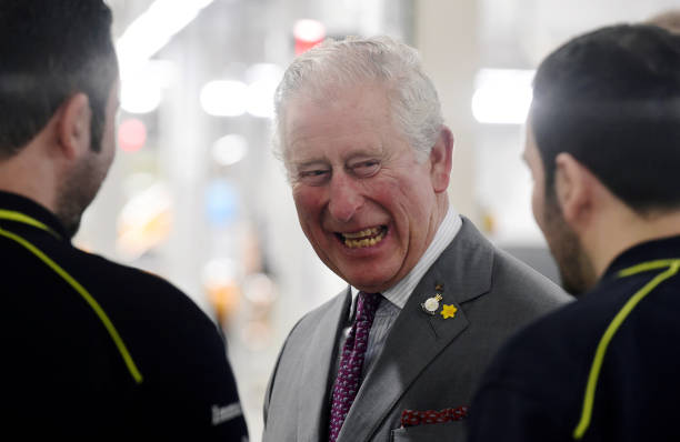 Prince Charles Prince of Wales speaks to employees during a tour of the new Aston Martin Lagonda factory on February 21 2020 in Barry Wales