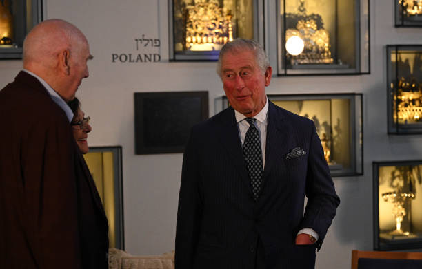 Prince Charles Prince of Wales speaks with George Shefi and Marta Wise whilst attending a reception in honour to Holocaust survivors at the Israel...