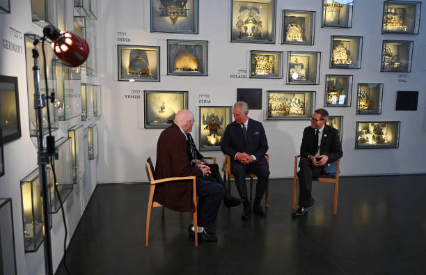 Prince Charles Prince of Wales speaks with George Shefi and Marta Wise whilst attending a reception in honour to Holocaust survivors at the Israel...
