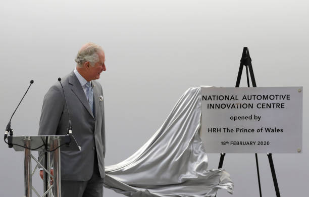 Prince Charles Prince of Wales unveils a plaque during a visit to officially open the National Automotive Innovation Centre and see the latest...