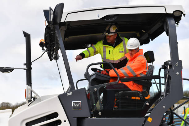 Prince William Duke of Cambridge operates an Asphalt Paver during a visit to the Tarmac National Skills and Safety Park on February 26 2020 in Nether...