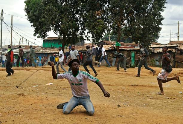 Image result for people throwing stones kenya