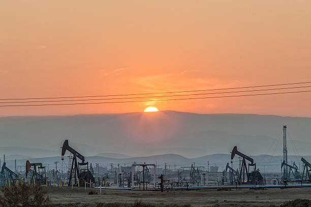 Pump jacks at the Belridge Oil Field and hydraulic fracking site which is the fourth largest oil field in California. Kern County, San Joaquin...