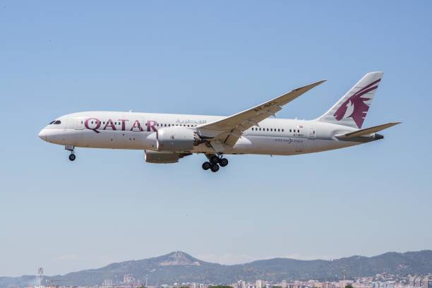 qatar airways airplane is seen landing at el prat airport picture