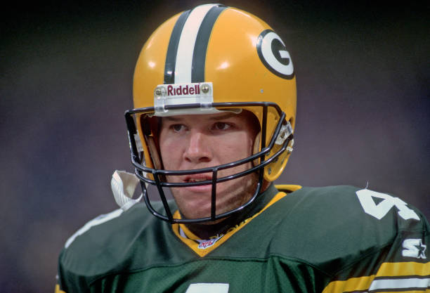 Quarterback Brett Favre of the Green Bay Packers looks on from the sideline during a game against the Cleveland Browns at Cleveland Municipal Stadium...