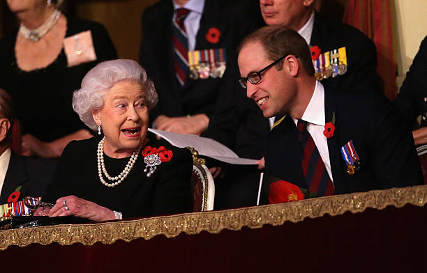 Queen Elizabeth II and Prince William Duke of Cambridge chat to each other in the Royal Box at the Royal Albert Hall during the Annual Festival of...
