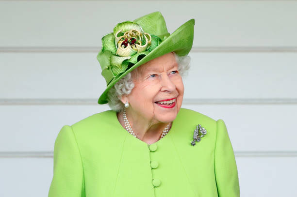 Queen Elizabeth II attends the Out-Sourcing Inc. Royal Windsor Cup polo match and a carriage driving display by the British Driving Society at Guards...