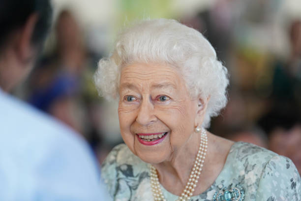 GBR: Queen Elizabeth II Visits Thames Hospice