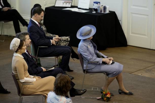 Queen Margrethe II of Denmark has taken seat in front of Crown Princes Mary of Denmark Crown Prince Frederik of Denmark and Prince Joachim of Denmark...