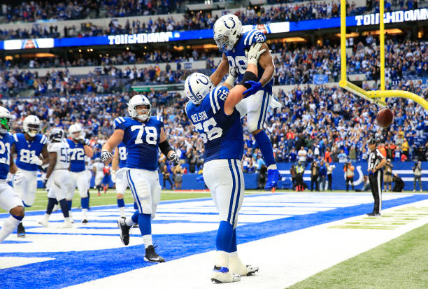 Quenton Nelson lifts up Jonathan Taylor of the Indianapolis Colts after a touchdown in the second half against the Tennessee Titans at Lucas Oil...