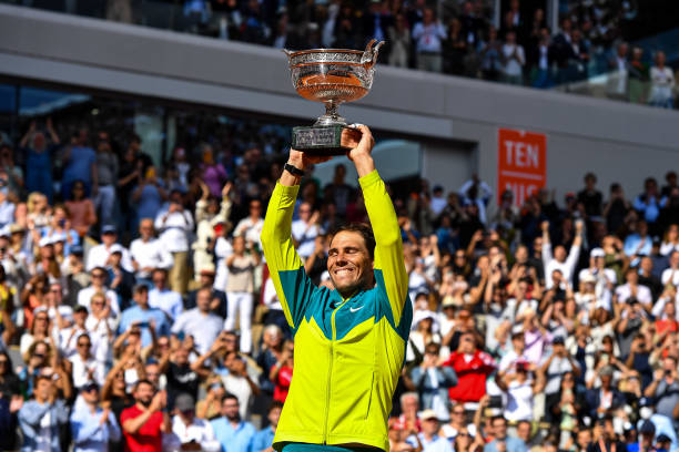 Rafael NADAL of Spain celebrates his victory with the Musketeers Cup after the men's final, on day fifteen of Roland Garros on June 5, 2022 in Paris,...