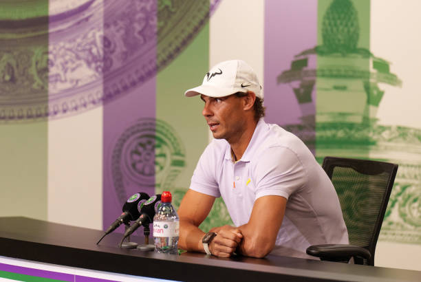 Rafael Nadal of Spain talks to the Media to announce his withdrawal from the tournament during a press conference on day eleven of The Championships...