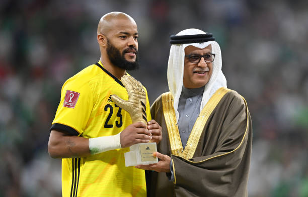 Rais Mbolhi of Algeria receives the Adidas Golden Glove award following the FIFA Arab Cup Qatar 2021 Final match between Tunisia and Algeria at Al...