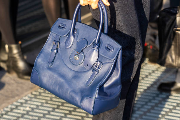 Ralph Lauren handbag worn by Crown Princess Victoria of Sweden while attending a seminar on cancer strategy at the Karolinska Institute on February 3...