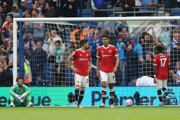Raphael Varane of Manchester United dejected after Marc Cucurella of Brighton & Hove Albion scored a goal to make it 2-0 during the Premier League...